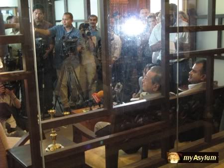 Press conference thru the glass wall, hosting by Photobucket